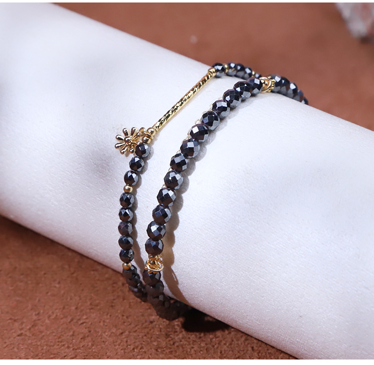 Bracelet - Hemitite - faceted bead - Gun black -3mm  copper plated gold bend -2*20mm  Small flower hanging -18 4cm